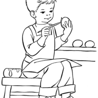 Desenho de Menino pintando ovos de Páscoa para colorir