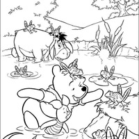 Desenho de Pooh, Leitão e Ió brincando com sapos para colorir