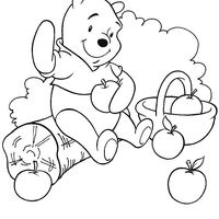 Desenho de Winnie the Pooh colhendo maçãs para colorir