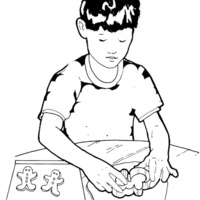 Desenho de Menino preparando biscoito natalino para colorir