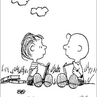 Desenho de Charlie Brown e Linus lendo um livro para colorir
